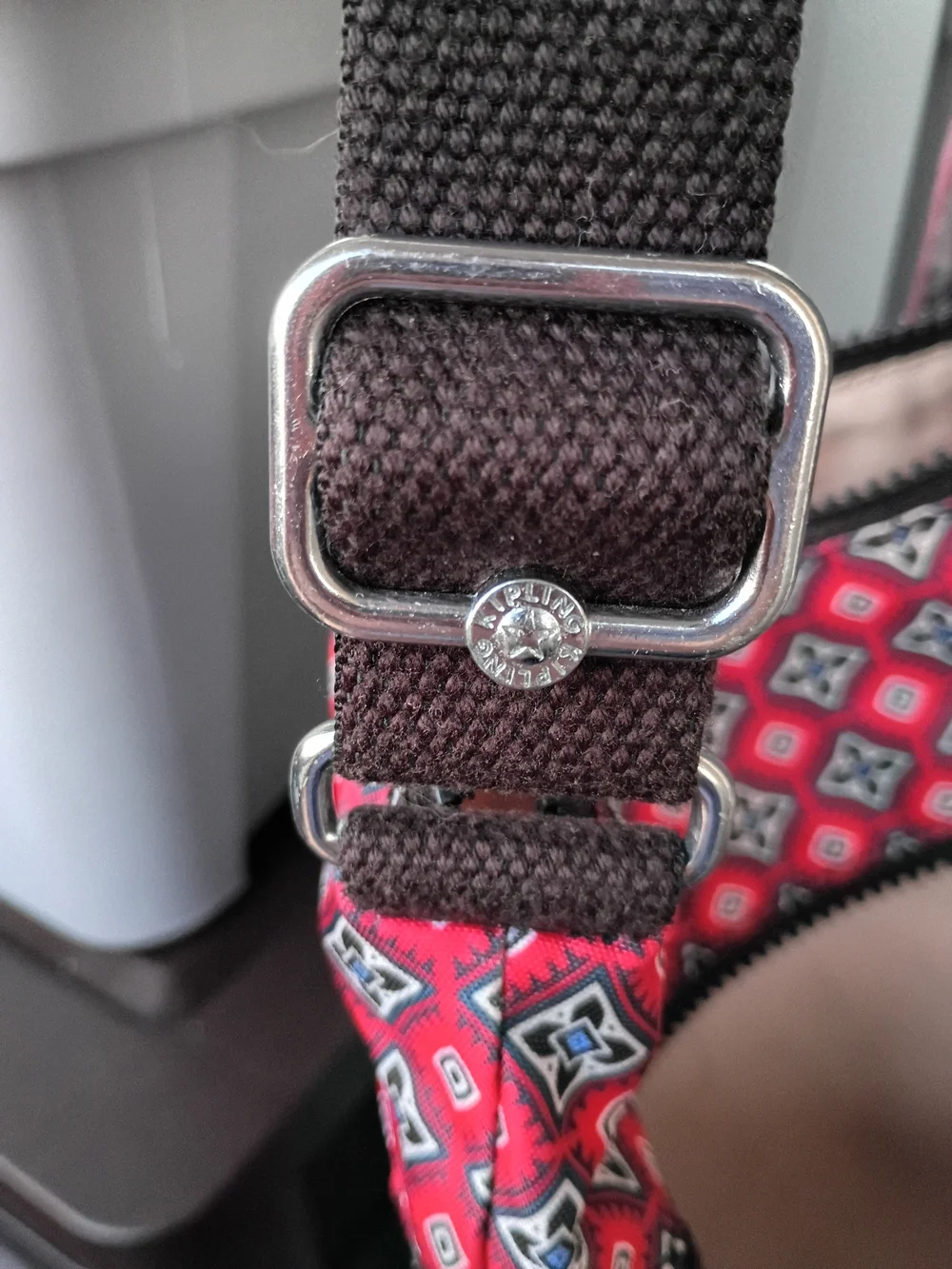 Kipling Jaime crossbody shoulder bag in the red mystical medallion